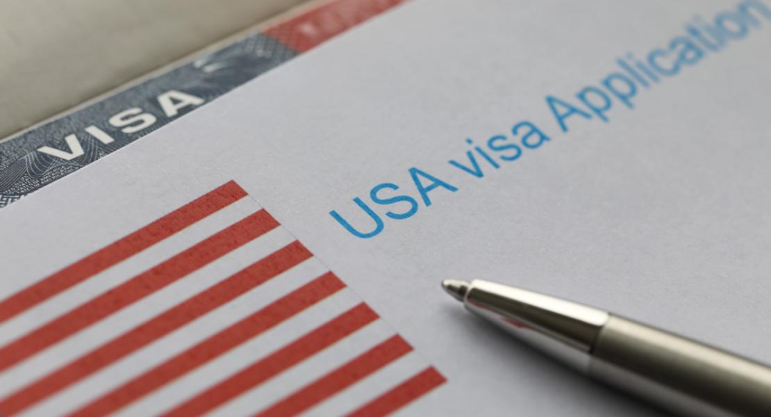 USA flag on a Visa Application form